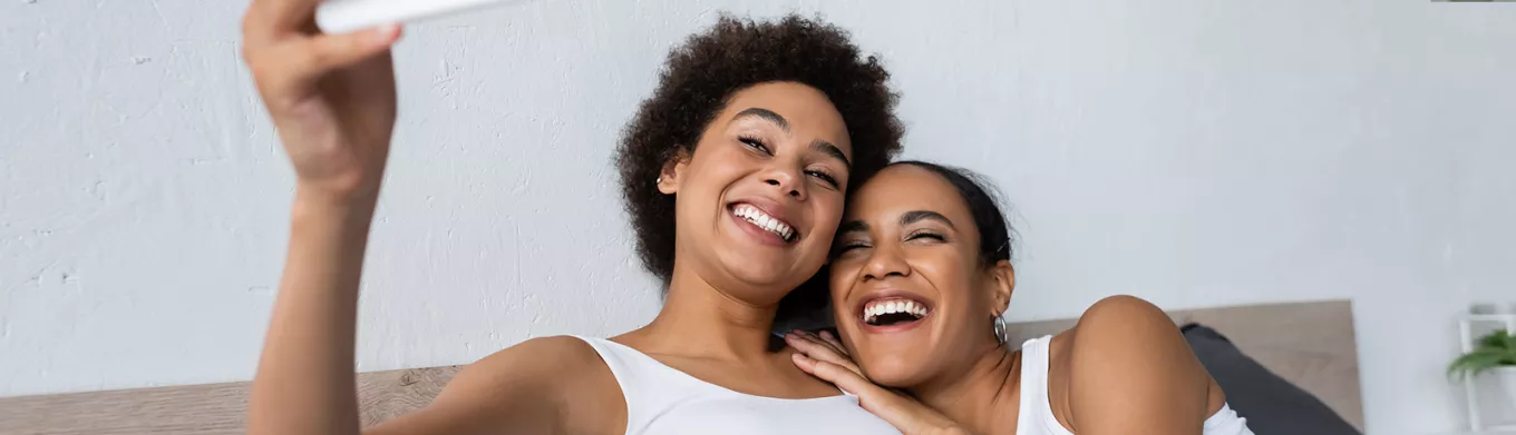 women smiling and happy