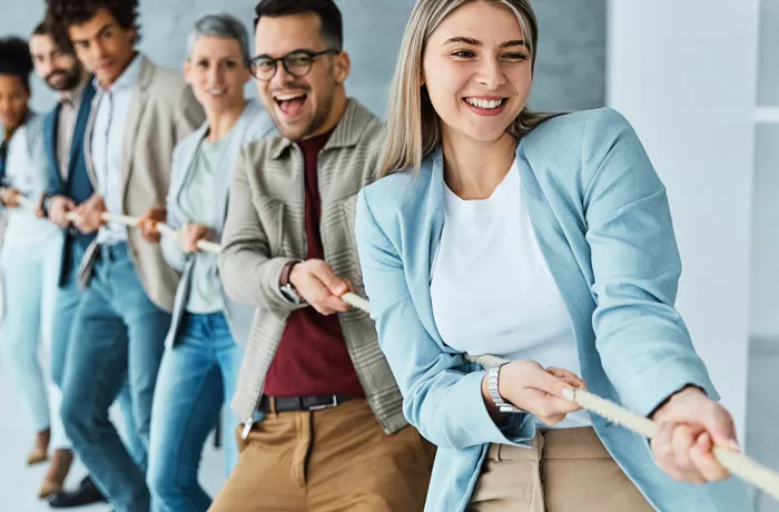 group of people doing rug or war depicting personal and workplace resilience