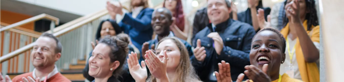 Group of people clapping