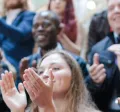 Group of people clapping